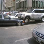 Mitsubishi Pajero riding over a Mercedes in Abu Dhabi