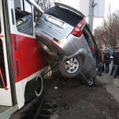 Train hits mini van in Russia